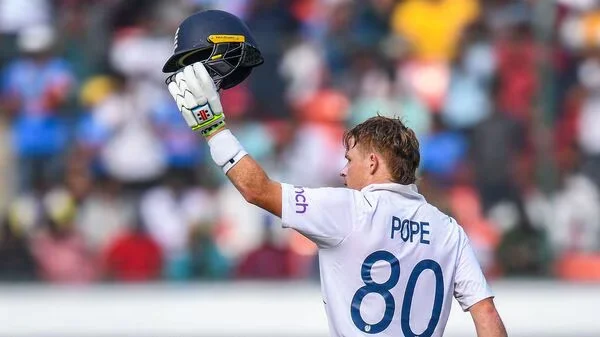  England's Ollie Pope celebrates after scoring a century (100 runs) during the third day of the first Test cricket match between India and England at the Rajiv Gandhi International Stadium in Hyderabad on January 27, 2024.